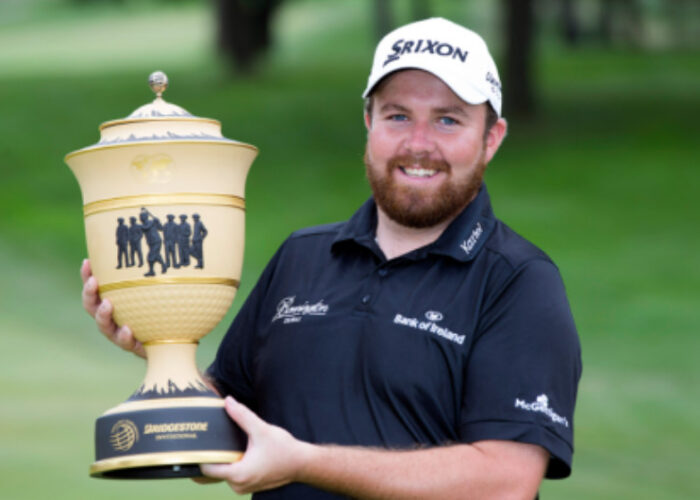 Shane Lowry holding the WGC Bridgestone Invitational trophy