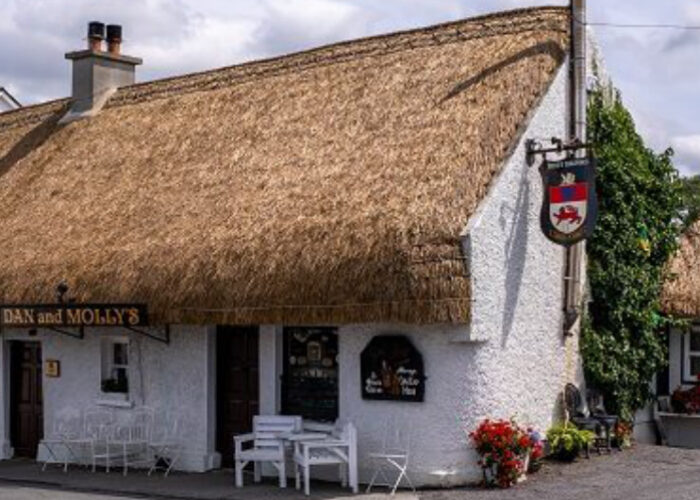 Thatched Roof Pub Named Dan and Mollys