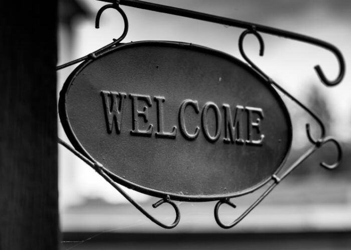 Black Metal Oval Welcome Sign With Scrollwork