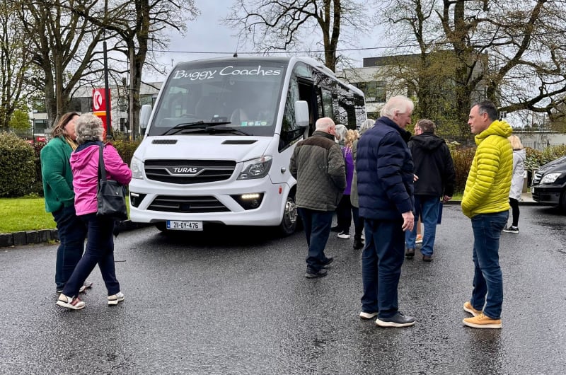 Group Gathered Near Buggy Coaches White Minibus