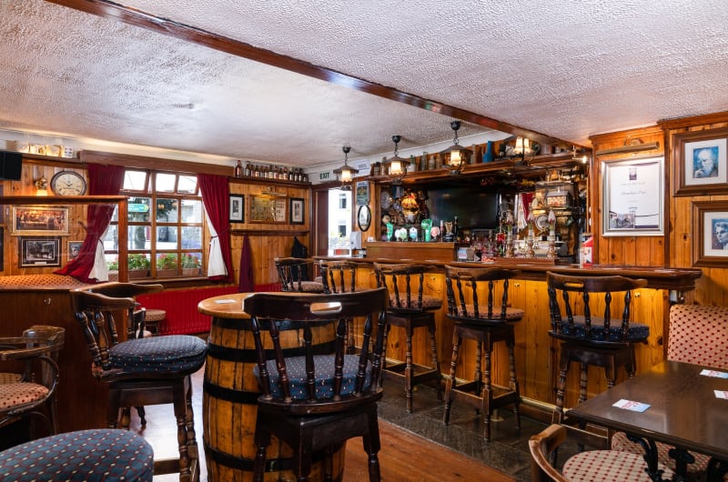 Interior of Hamiltons Pub with wooden bar counter