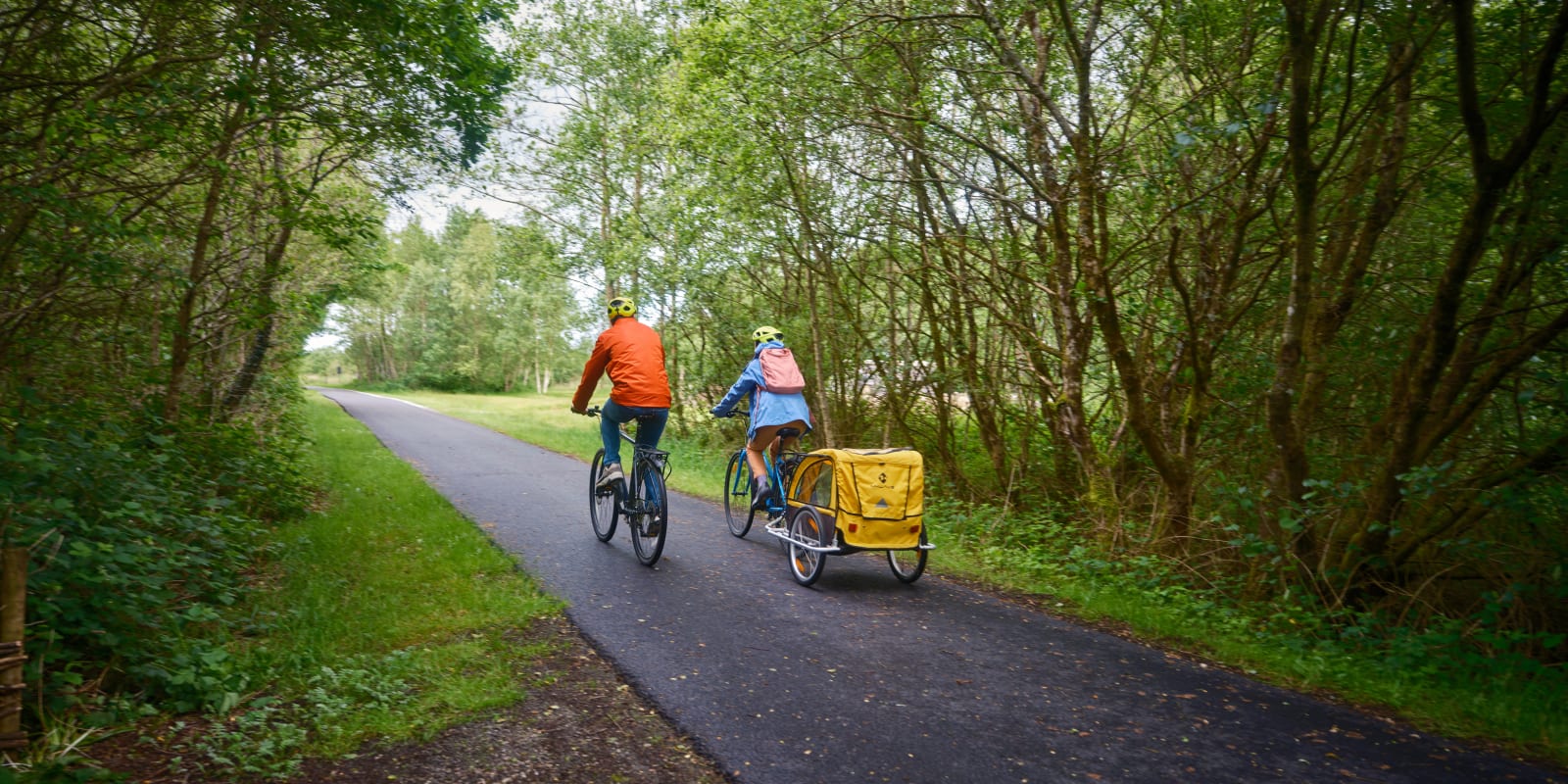 Lough Boora Discovery Park Two People Cycling On Path