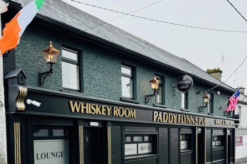 Paddy Flynns Pub Exterior Whiskey Room Sign