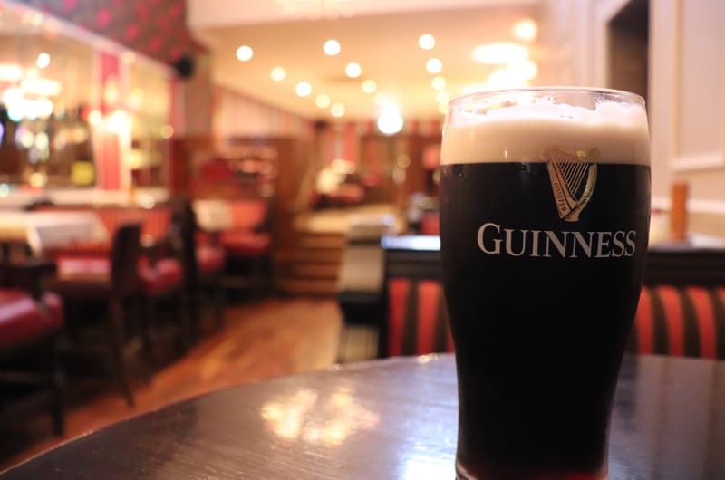 Pint of Guinness beer in a pub