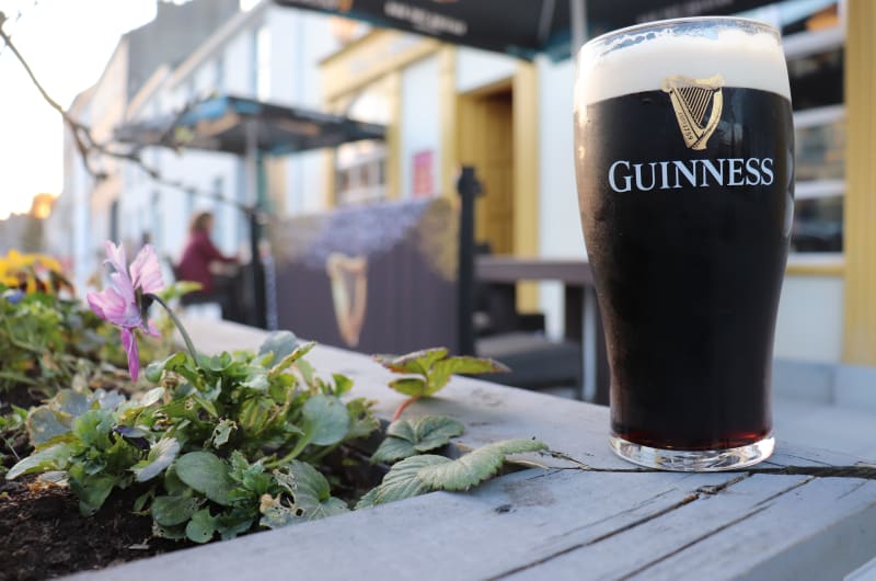 Pint of Guinness on outdoor pub table