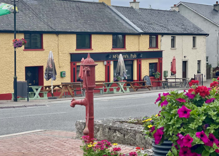 Red Water Pump In Front Of Mcintyres Pub