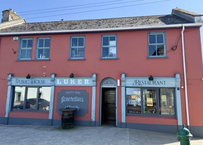 Red facade of Lukers Public House and Restaurant