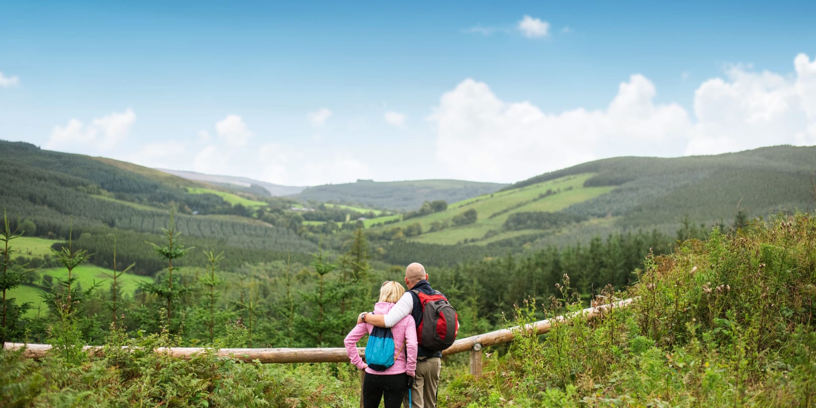 Slieve Blooms Couple Hiking Overlooking Scenic Green Mountain Valley