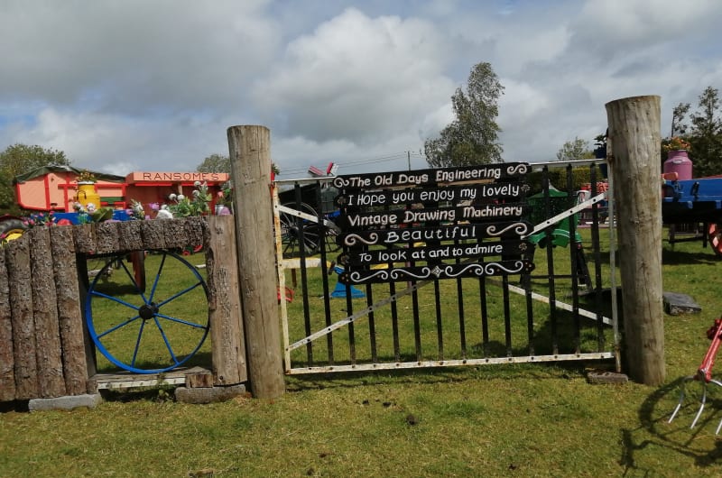 Vintage machinery display with engineering sign and wheel ndosi9
