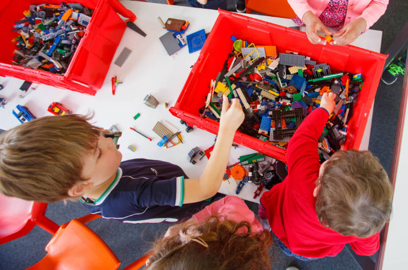 children playing with lego