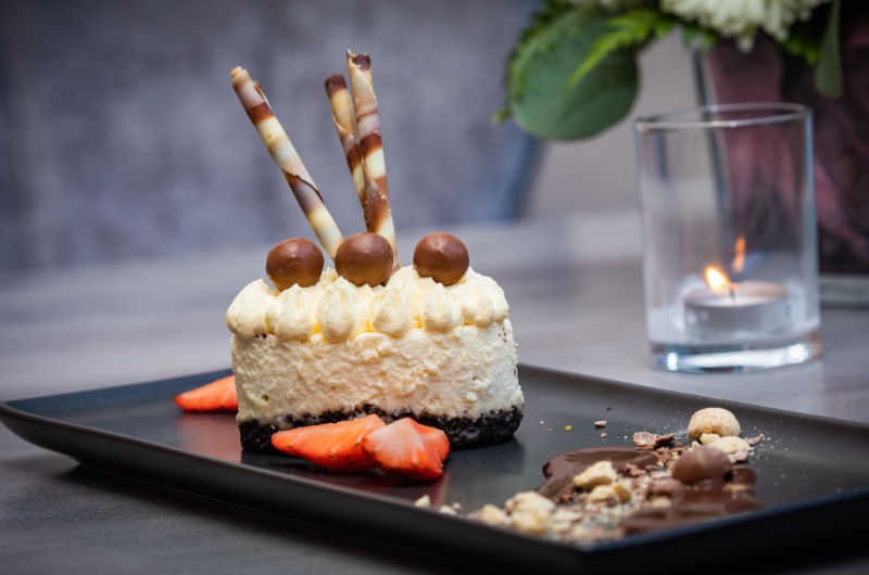 desert on black plate