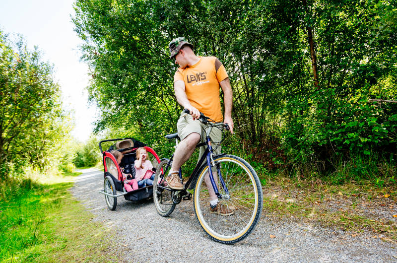 park father and family on bike