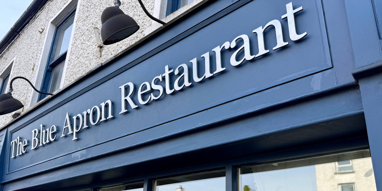 the blue apron restaurant header