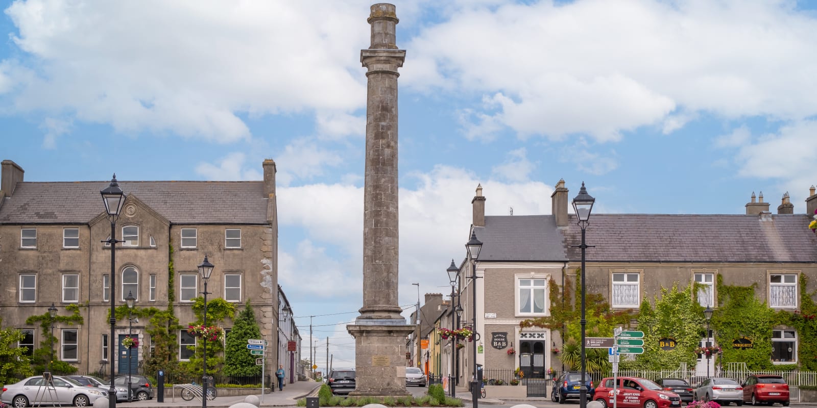 Birr Header Image Tall stone column in a historic town square bgamid