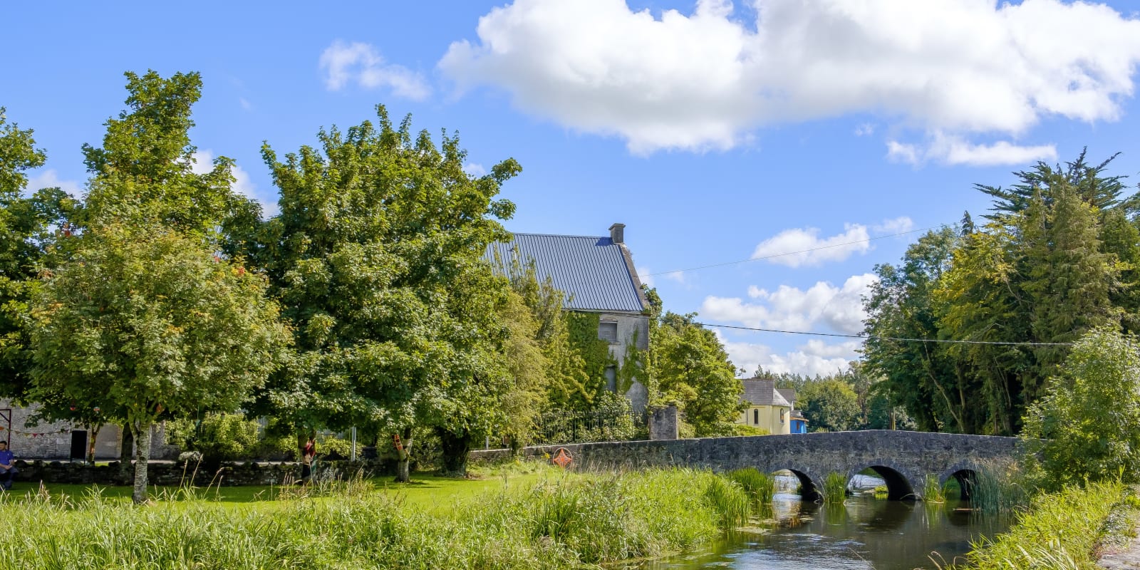 Clara Header Image Scenic Stone Arch Bridge Over A River litkka