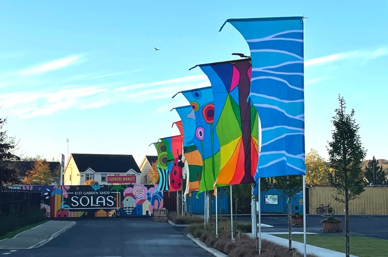 Colorful flags in front of SOLAS Garden Shop zxicqx
