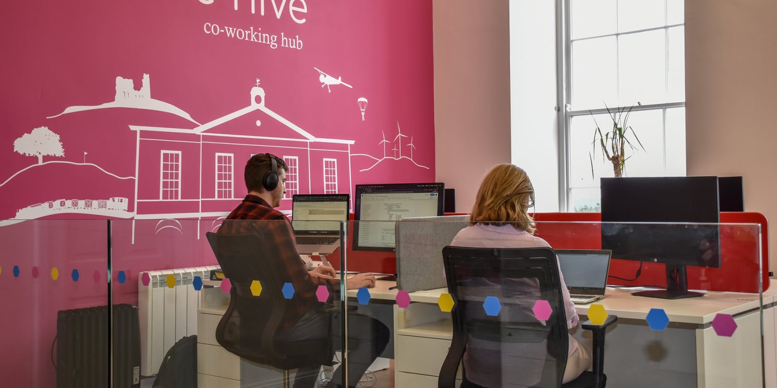 Ehive Coworking Hub Interior With People Working