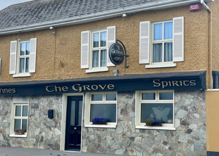 Exterior of The Grove pub with Guinness sign jfdsf8