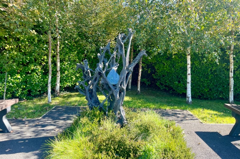 Gnarled Wood Sculpture With Blue Glass Drop ljm43g