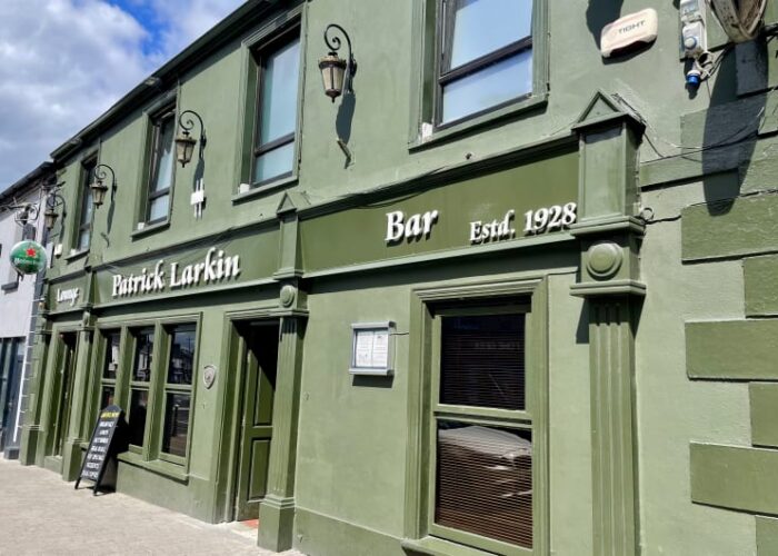 Green exterior of Patrick Larkin Bar and Lounge vb4bku