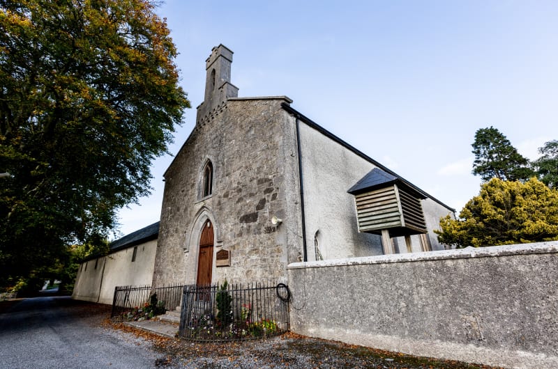 Historic Stone Monastic Building With Arched Wooden Door ddnmua