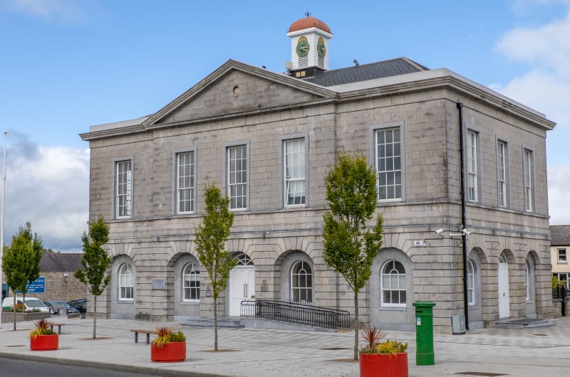 Historic Stone Town Hall With Clock Tower