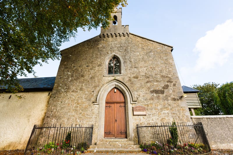 Killeigh Parish Church stone facade and wooden door ulx8m7