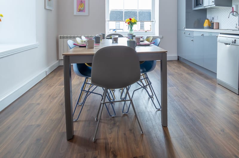 Modern Office Kitchen With Ehive Logo And Table