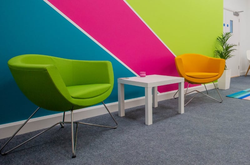 Modern Office Waiting Area With Colorful Furniture