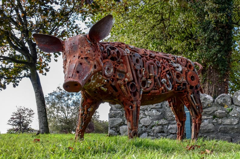 Rusty Metal Pig Sculpture Made Of Gears