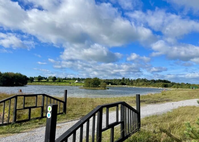 Scenic Lake View With Gravel Path And Railings ue0j7z