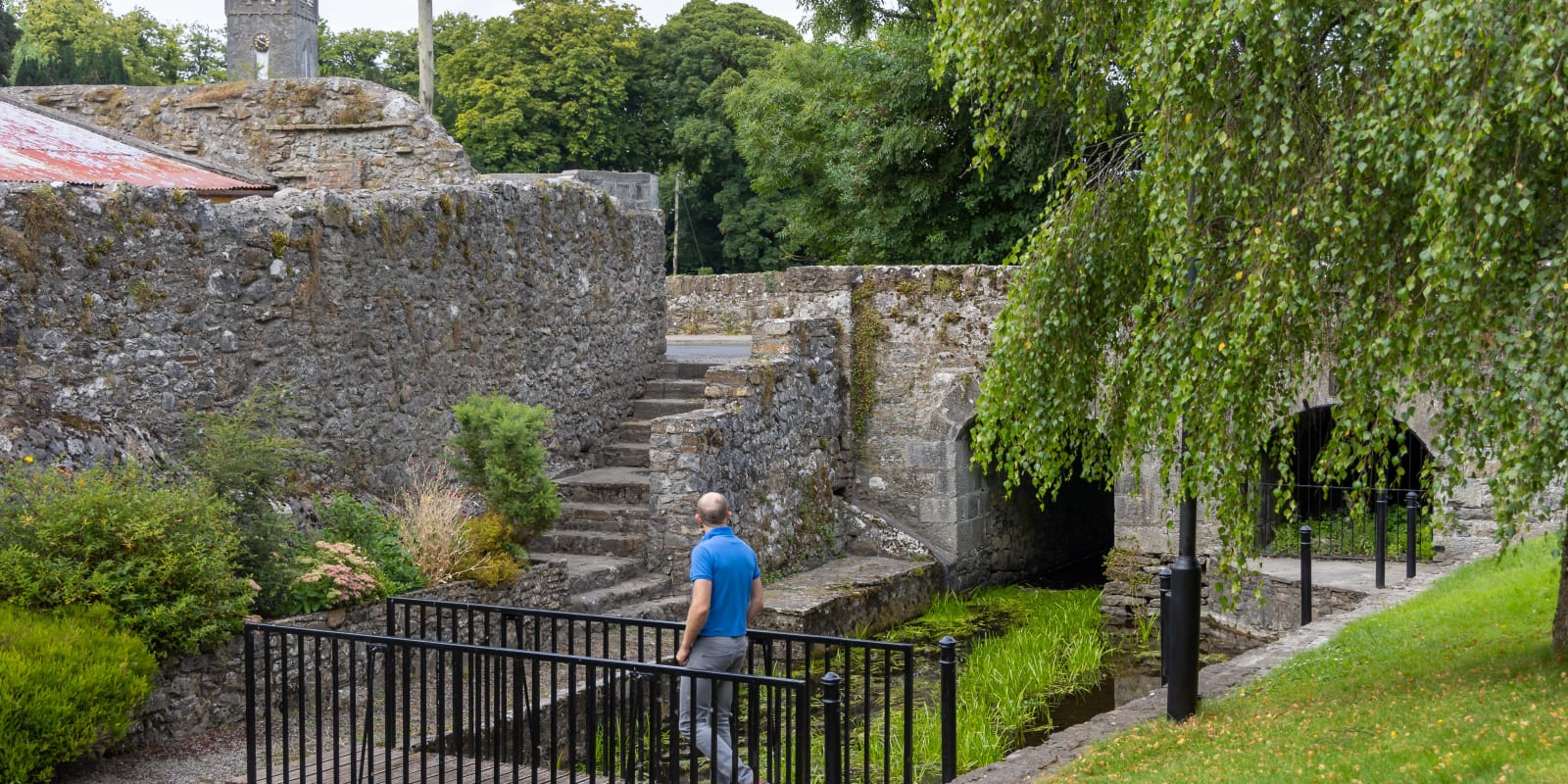 Shinrone Sensory Walk Man Crossing Small Bridge Near Old Stone Walls
