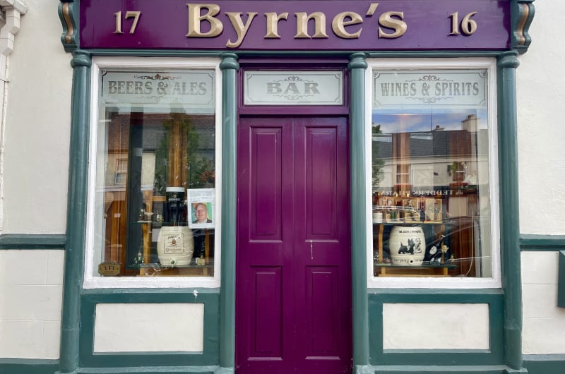 Traditional purple storefront of Byrnes Bar exterior z0zbbo