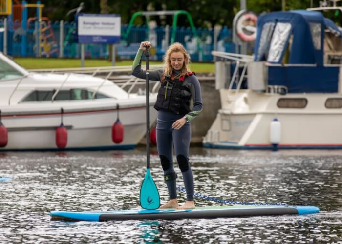 Woman on paddleboard at Banagher Harbour z63pgh