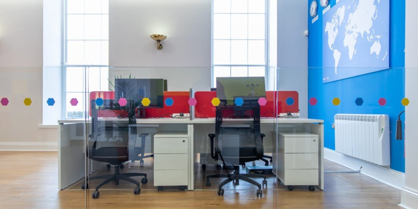e Hive Modern office hotdesks with computers and map