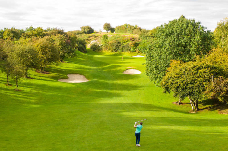 esker golf golfer hitting ball