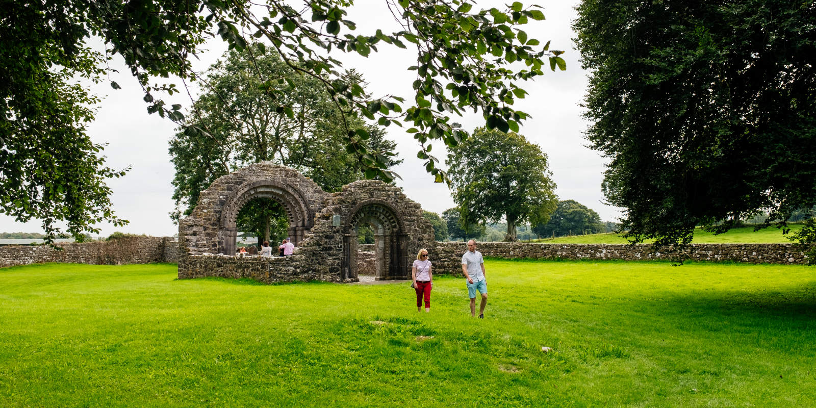 header couple visiting ruin