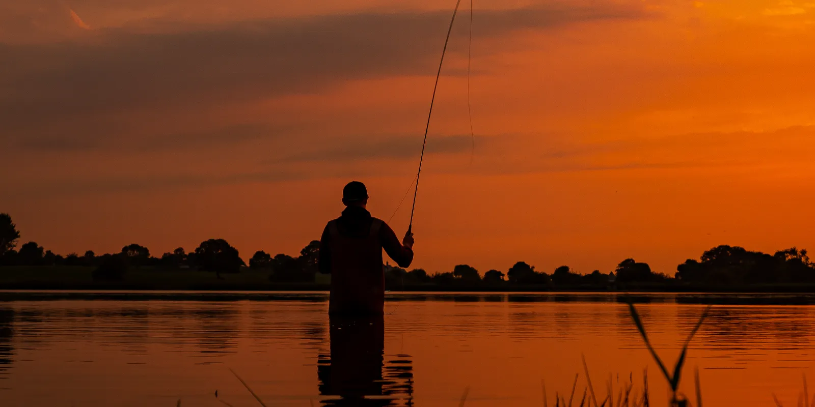 header rivers fisherman silhouette
