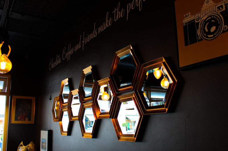 hexagon mirrors on dark wall