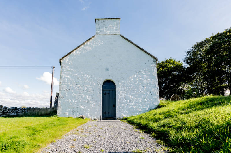 rahan white church tall blue door