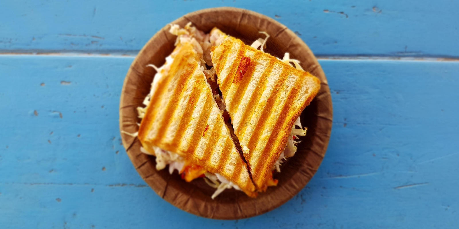 skullys toastie on wooden plate header