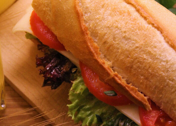 sub sandwiche on wooden plate