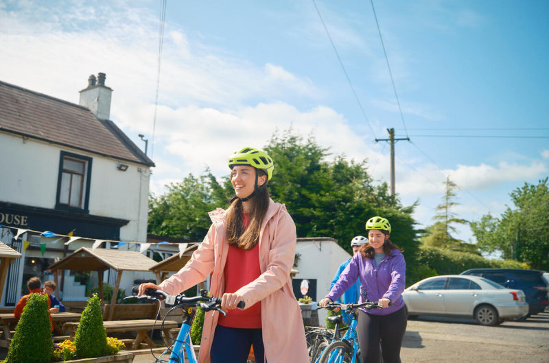 three women mountain bikes