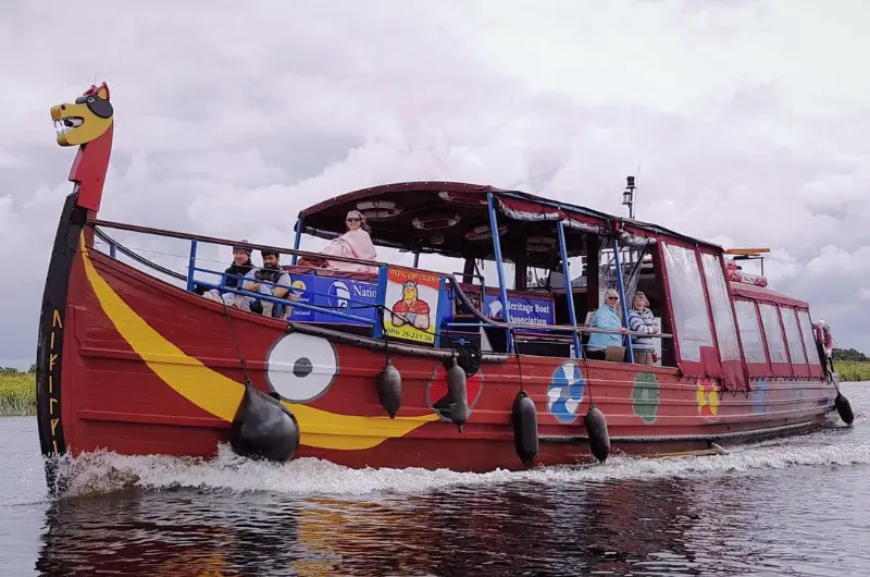 viking style boat on river