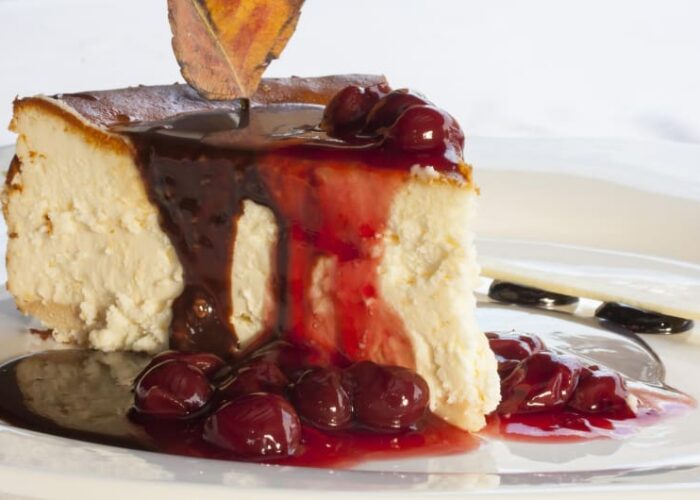 Cheesecake Slice With Chocolate And Cherry Sauce nmjoga