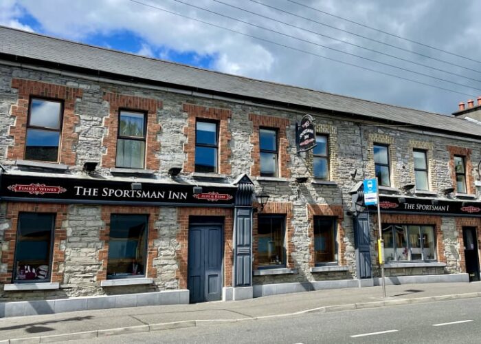 Exterior stone facade of The Sportsman Inn pub