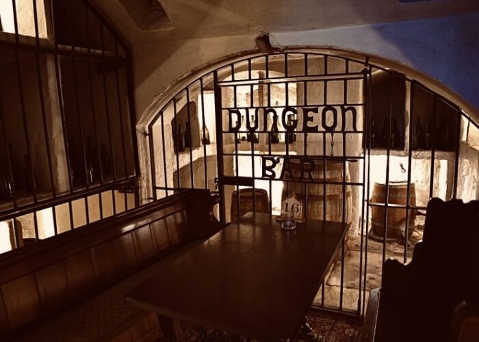 Interior Of A Dungeon Bar With Iron Gate