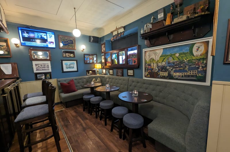 Interior Of An Irish Pub With Tables And Decor