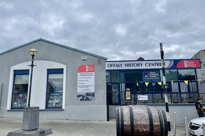 Offaly History Centre Building Exterior With Wooden Barrel