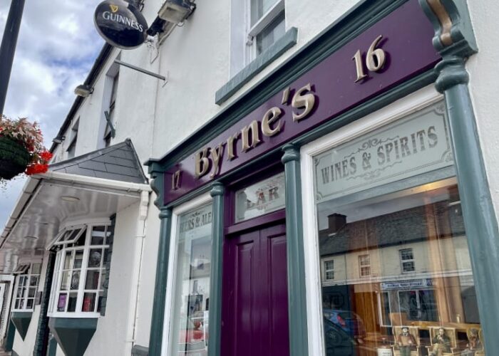 Traditional Byrnes 16 Pub Storefront With Guinness Sign